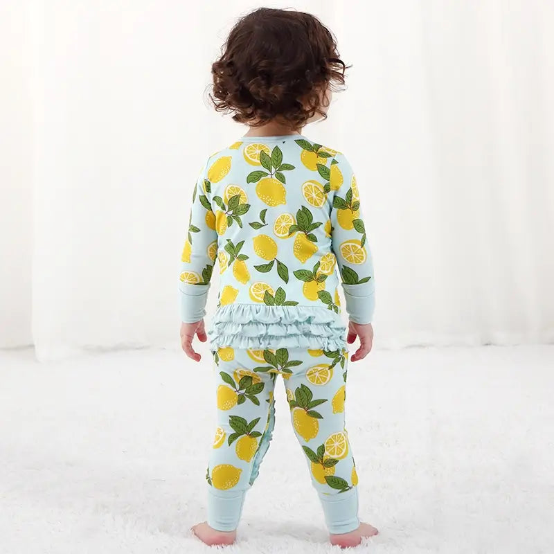 Fabricante de mamelucos para bebés con cremallera y estampado de frutas personalizado