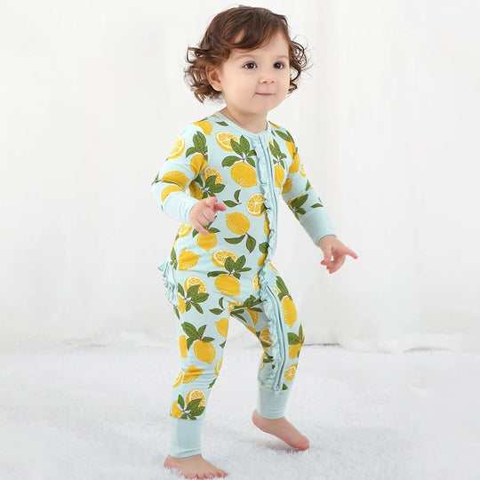 Fabricante de mamelucos para bebés con cremallera y estampado de frutas personalizado