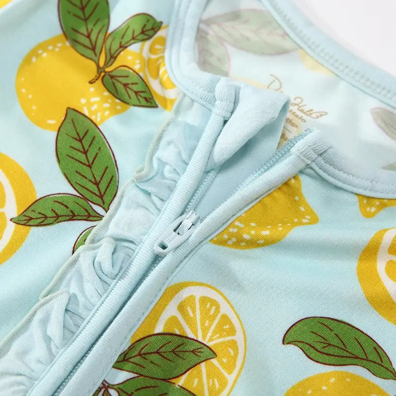 Fabricante de mamelucos para bebés con cremallera y estampado de frutas personalizado